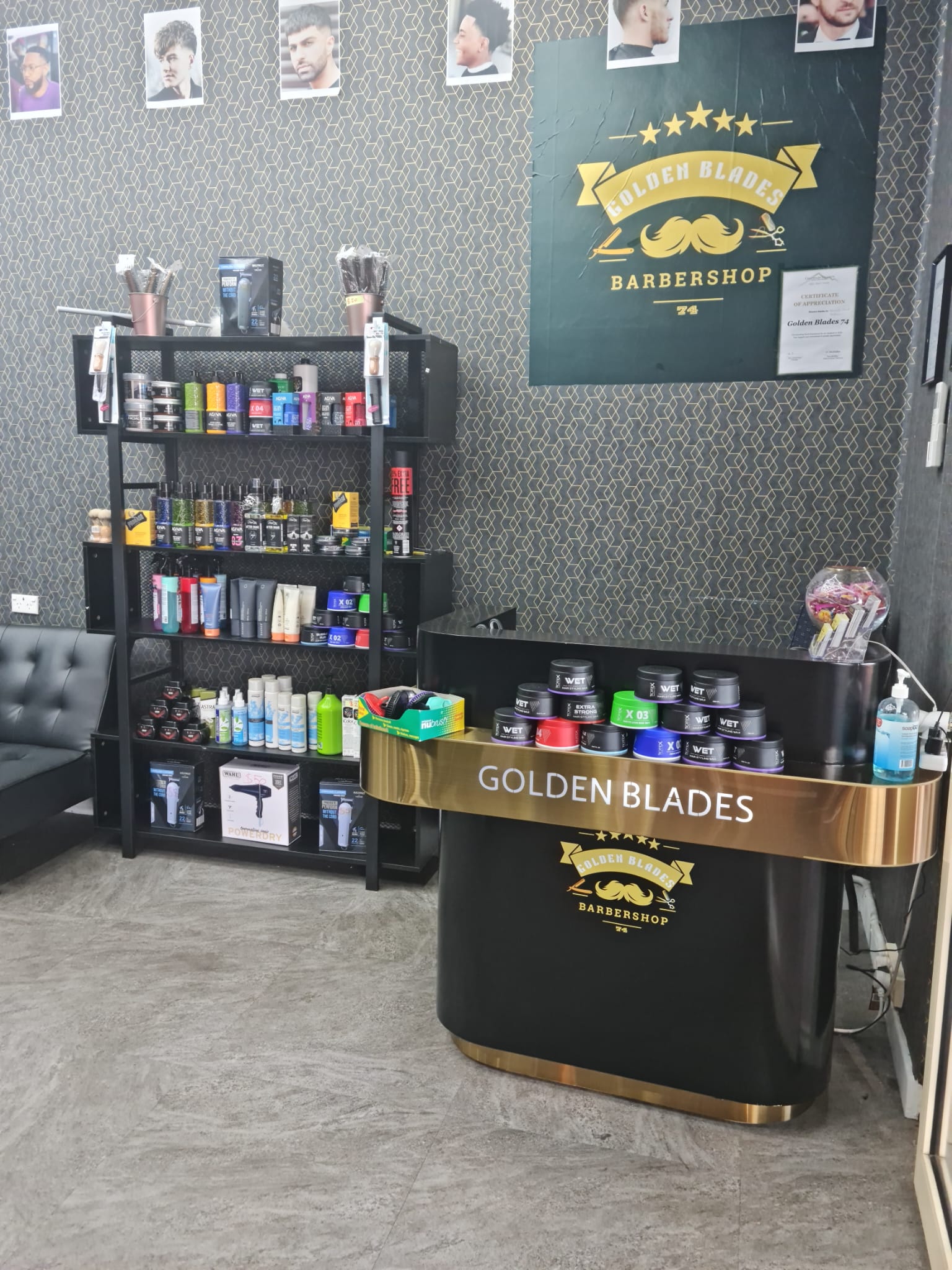 The Golden Blades counter and products display inside the East Toowoomba barbershop